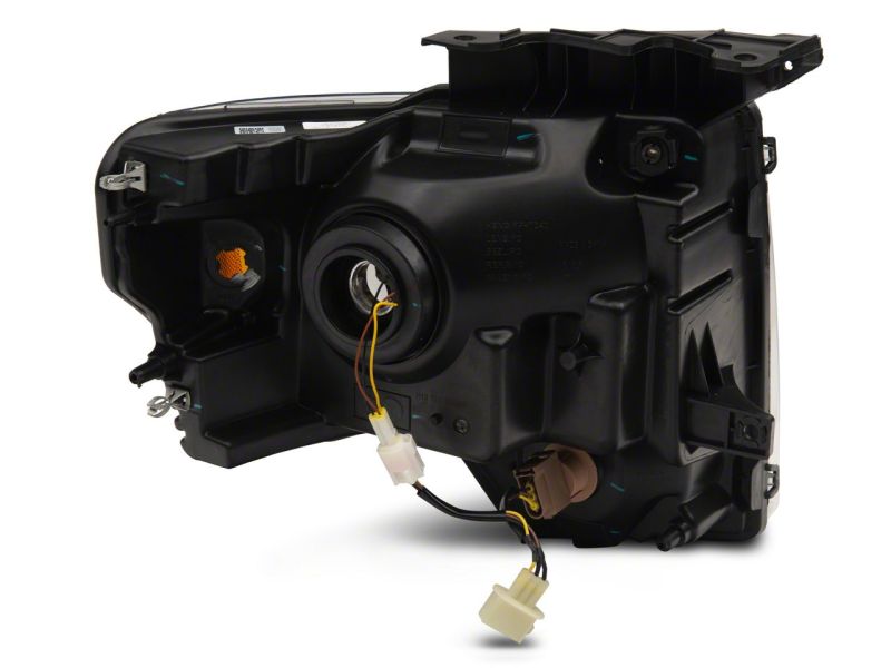 Raxiom 09-14 Ford F-150 Axial Series Headlight w/ SEQL LED Bar- Blk Housing (Clear Lens) Light Bars & Cubes Raxiom