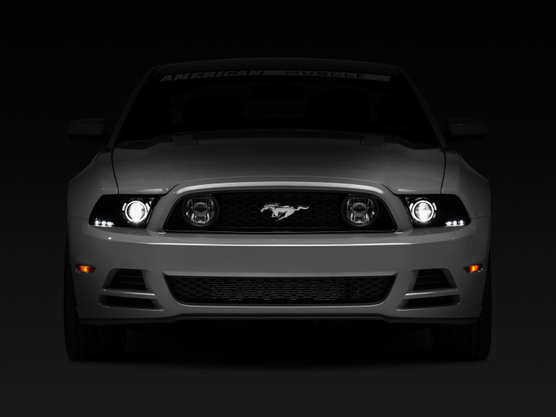 Raxiom 13-14 Ford Mustang w/ Factory HIDLED Halo Projector Headlights- Black Housing (Smoked Lens) Headlights Raxiom