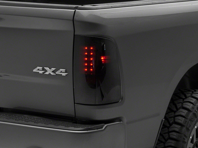Raxiom 09-18 Dodge RAM 1500/2500/3500 Axial Series LED Tail Lights- BlkHousing- SmokedLens Tail Lights Raxiom