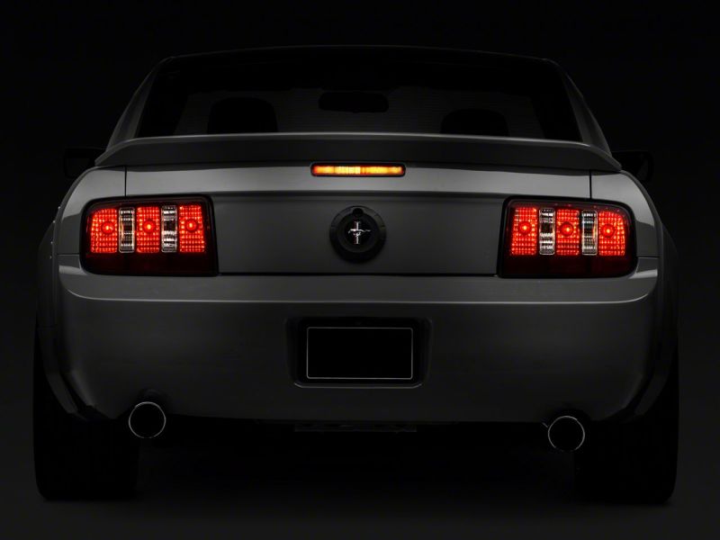 Raxiom 05-09 Ford Mustang Coyote Tail Lights- Blk Housing (Smoked Lens) Tail Lights Raxiom
