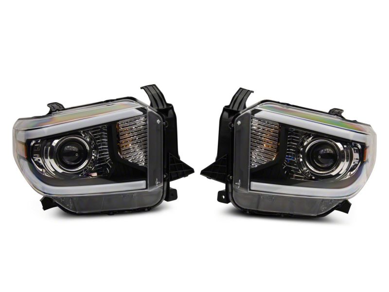 Raxiom 14-21 Toyota Tundra Axial Projector Headlights w/ SEQL LED Bar- Black Housing (Clear Lens) Headlights Raxiom
