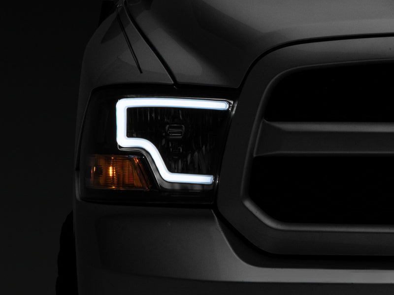Raxiom 09-18 Dodge RAM 1500 LED Bar Headlights- Black Housing (Clear Lens) Headlights Raxiom