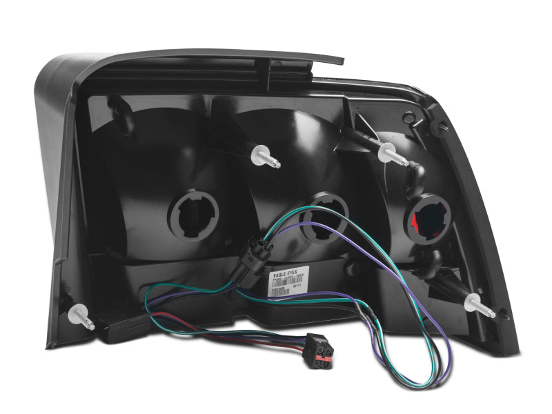 Raxiom 99-04 Ford Mustang Excluding 99-01 Cobra Icon LED Tail Lights- Black Housing (Smoked Lens) Tail Lights Raxiom