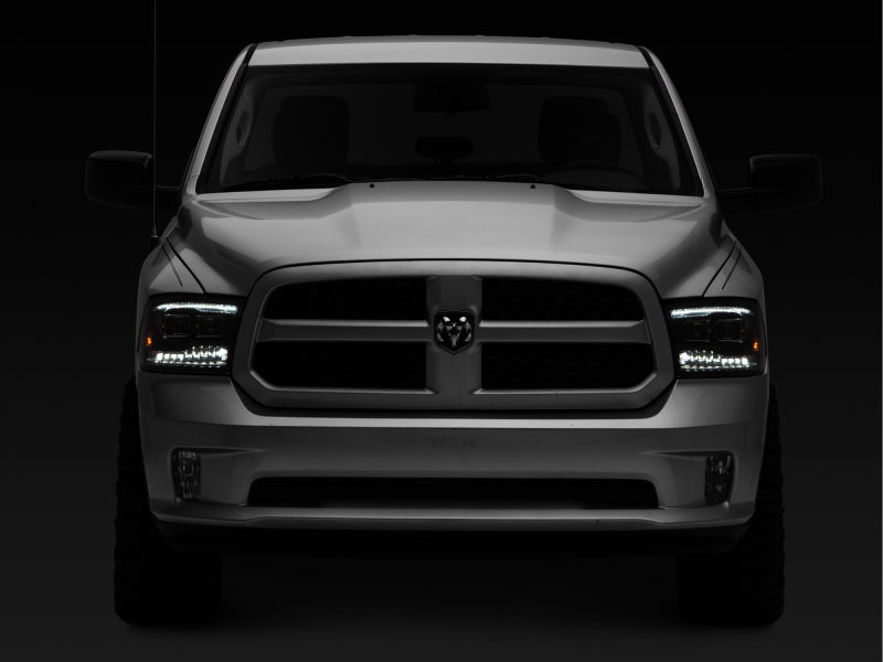 Raxiom 09-18 RAM 1500 LED Projector Headlights w/ Switchback Turn Signals- Blk Housing (Clear Lens) Headlights Raxiom