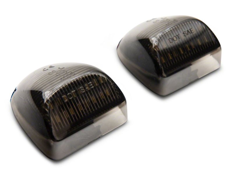 Raxiom 01-13 Chevrolet Silverado/GMC Sierra 1500 Axial Series LED License Plate Lamps- Smoked Bulbs Raxiom