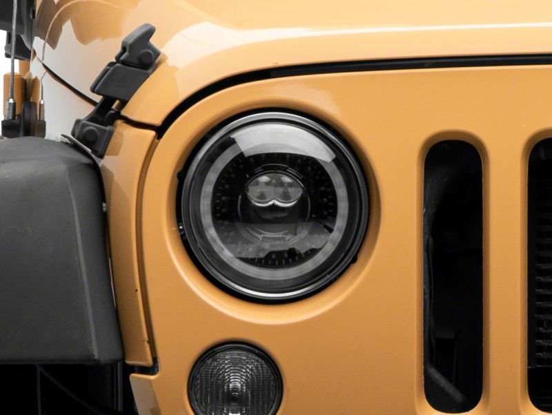 Raxiom 07-18 Jeep Wrangler JK Axial Series 7-In Dragon Eye LED Headlights- Blk Housing (Clear Lens) Headlights Raxiom