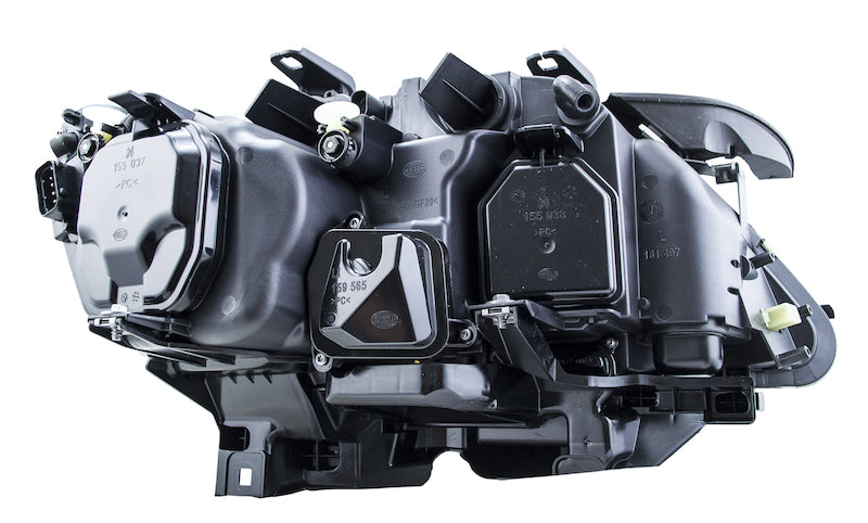 Hella 02-07 BMW 7 Series Bi-Xenon Headlight Left Clear Turn Signal Driving Lights Hella