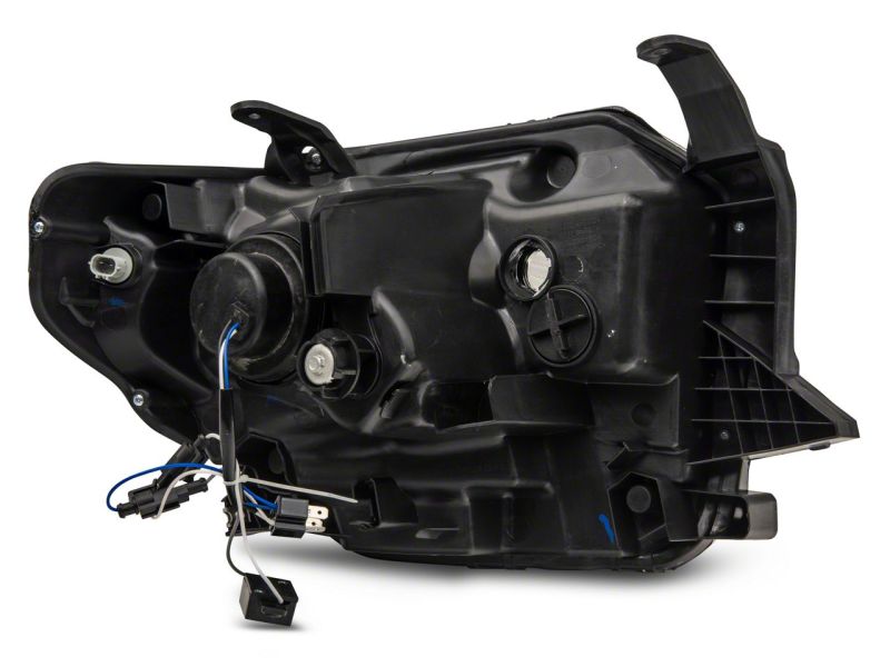 Raxiom 14-21 Toyota Tundra Axial Series Projector Headlights w/ LED Bar- Blk Housing (Clear Lens) Headlights Raxiom