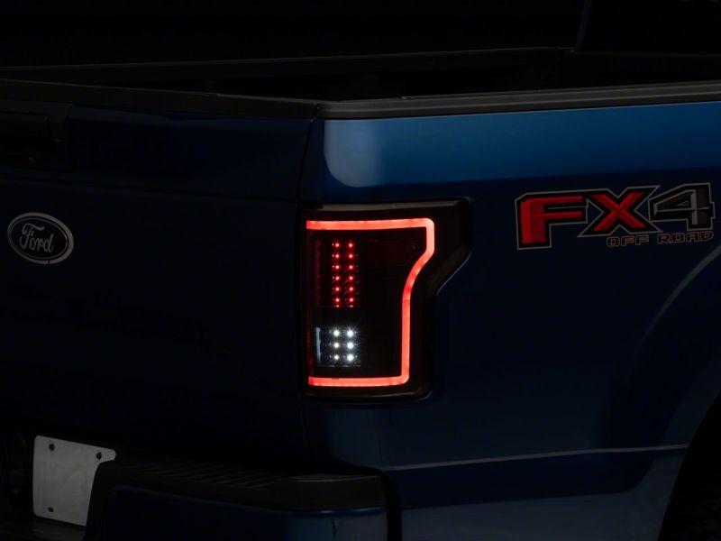 Raxiom 15-17 Ford F-150 LED Tail Lights w/ SEQL Turn Signals- Blk Housing (Clear Lens) Tail Lights Raxiom