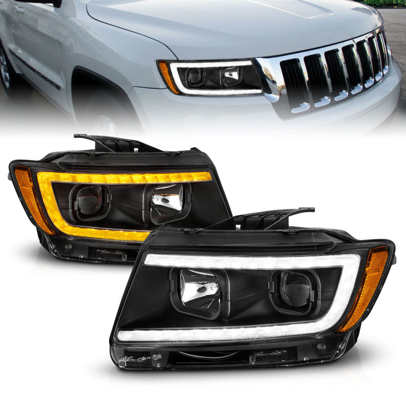 ANZO 11-13 Jeep Grand Cherokee (Factory Halogen Only) Projector Headlights w/Light Bar Swtchbk Black Headlights ANZO