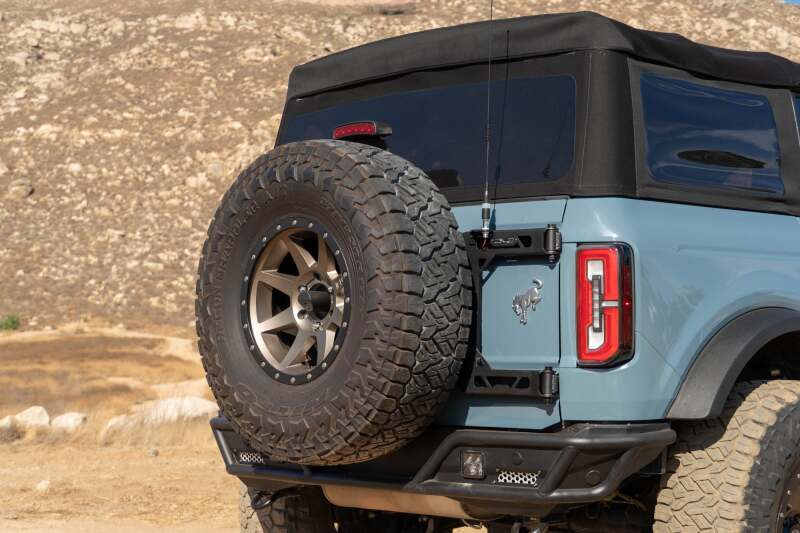 DV8 Offroad 21-24 Ford Bronco Tire Carrier Chase Racks DV8 Offroad
