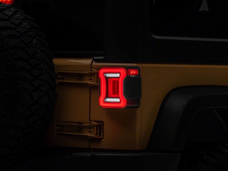 Raxiom 07-18 Jeep Wrangler JK Axial Series JL Style LED Tail Lights- BlkHousing- Red Lens Tail Lights Raxiom
