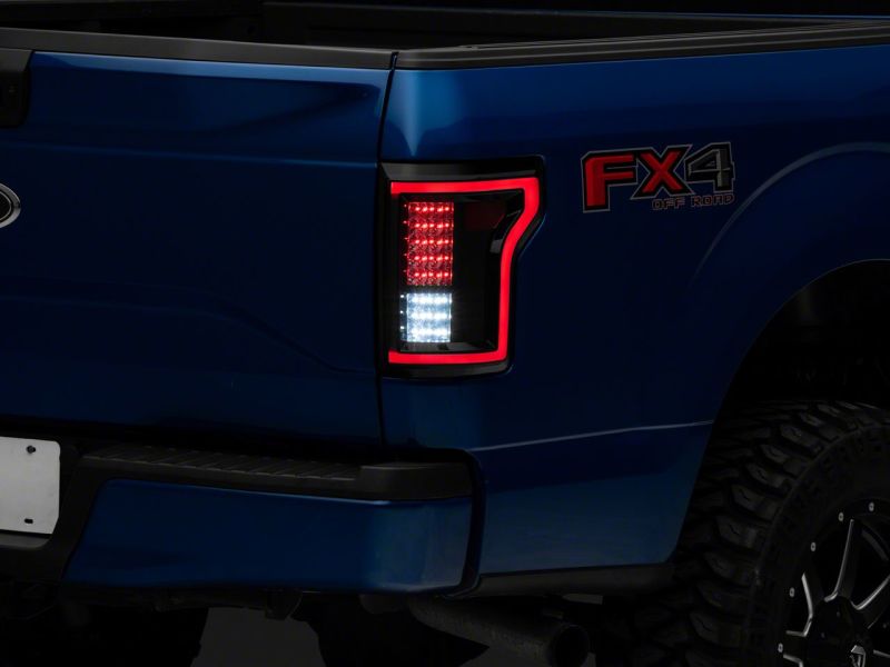 Raxiom 15-17 Ford F-150 LED Tail Lights- Blk Housing (Smoked Lens) Tail Lights Raxiom
