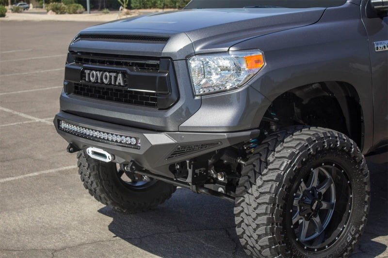 Addictive Desert Designs 2014+ Toyota Tundra Stealth Fighter Front Bumper w/Winch Mount & Sensors Bumpers - Steel Addictive Desert Designs