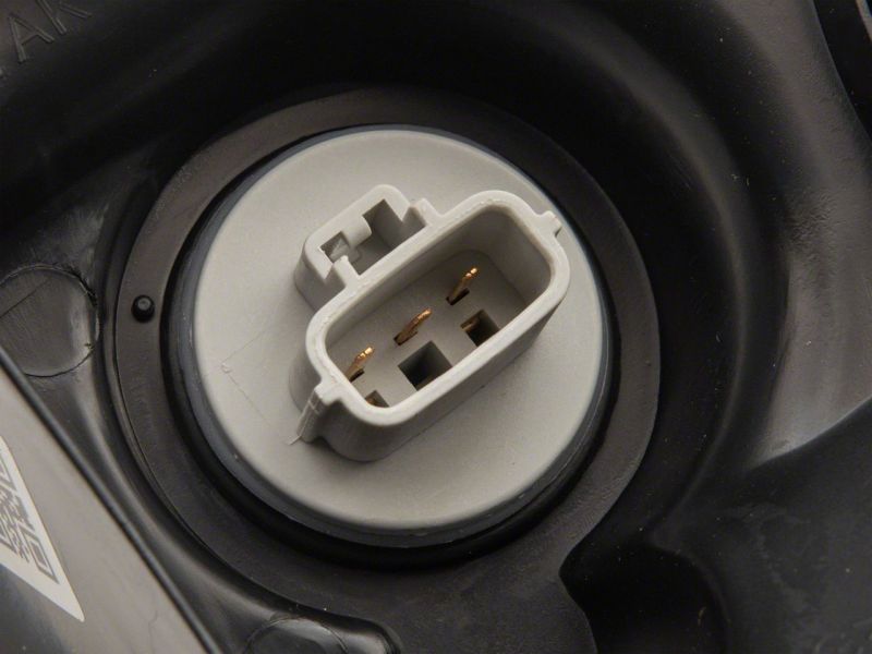 Raxiom 07-13 Toyota Tundra Axial Series Headlights w/ SEQL LED Bar- Blk Housing (Clear Lens) Headlights Raxiom