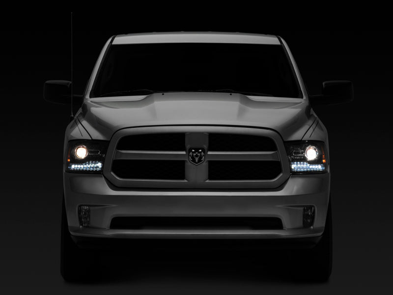 Raxiom 09-18 Dodge RAM 1500 LED Halo Headlights w/Switchback Turn Signals- Blk Housing (Clear Lens) Headlights Raxiom