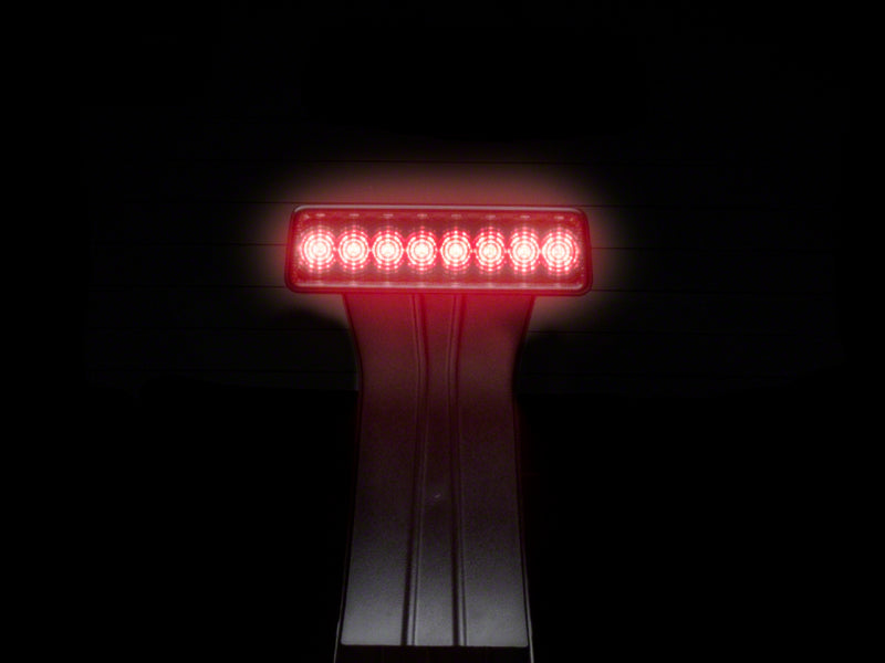 Raxiom 07-18 Jeep Wrangler JK Axial Series Hyper Flash LED Third Brake Light- Smoked Brake Lights Raxiom