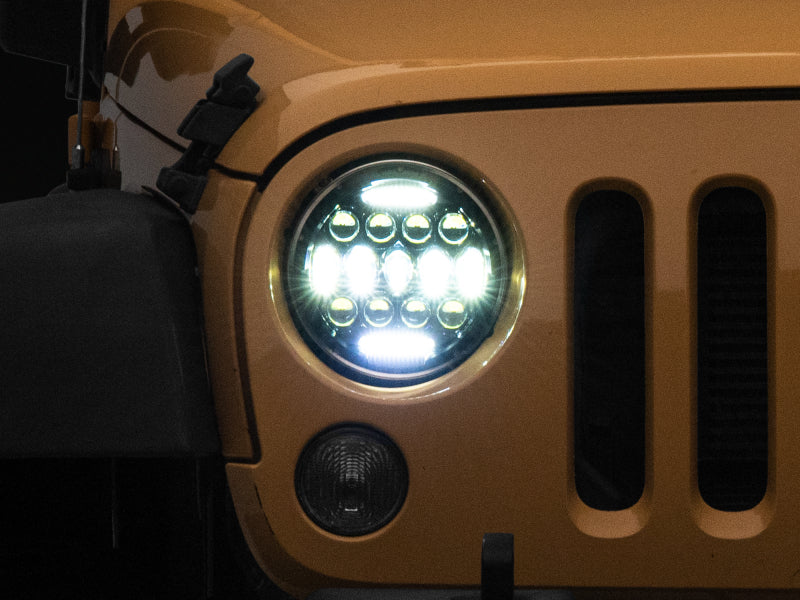 Raxiom 97-18 Jeep Wrangler TJ/JK Axial Series 13-LED Headlights- Black Housing (Clear Lens) Headlights Raxiom
