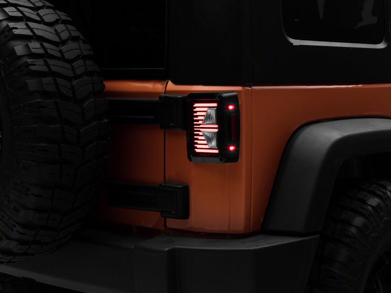 Raxiom 07-18 Jeep Wrangler JK Axial Series Vision LED Tail Lights- Blk Housing (Clear Lens) Tail Lights Raxiom