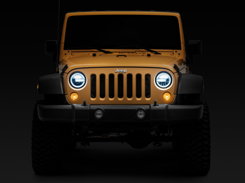 Raxiom 97-18 Jeep Wrangler TJ/JK 7-Inch LED Headlights w/ Halos- Black Housing (Clear Lens) Headlights Raxiom