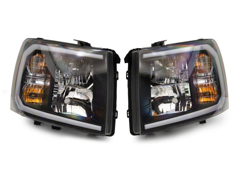 Raxiom 07-13 Chevrolet Silverado 1500 Axial Headlights w/ SEQL LED Bar- Black Housing (Clear Lens) Headlights Raxiom