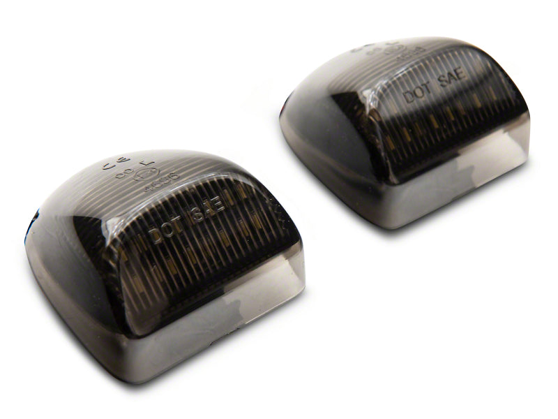 Raxiom 01-13 Chevrolet Silverado/GMC Sierra 1500 Axial Series LED License Plate Lamps- Smoked Bulbs Raxiom