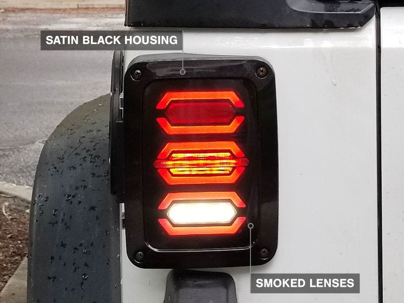 Raxiom 07-18 Jeep Wrangler JK LED Tail Lights- Black Housing (Smoked Lens) Tail Lights Raxiom