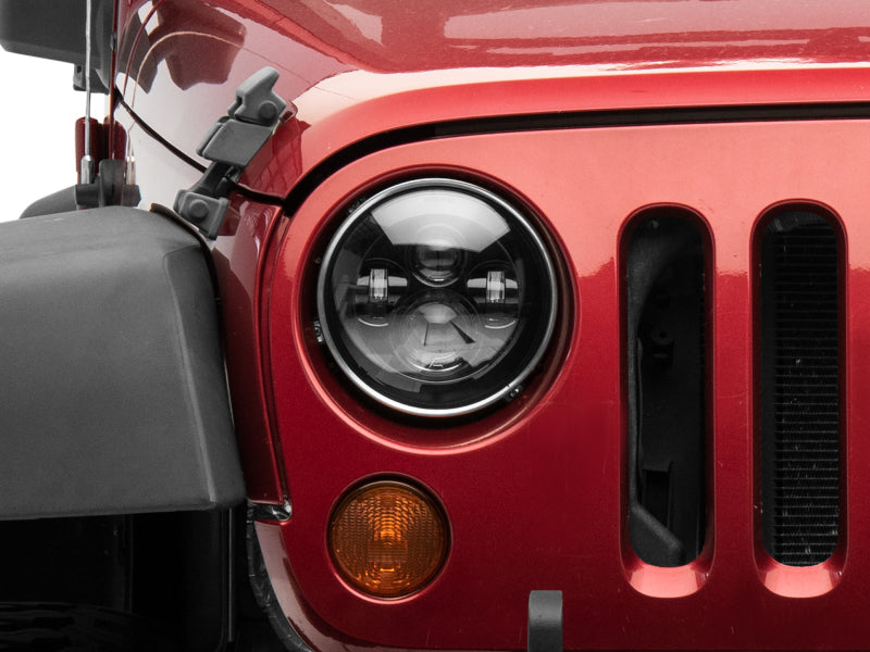 Raxiom 97-18 Jeep Wrangler TJ/JK Axial Series LED Daymaker Headlights- Black Housing (Clear Lens) Headlights Raxiom