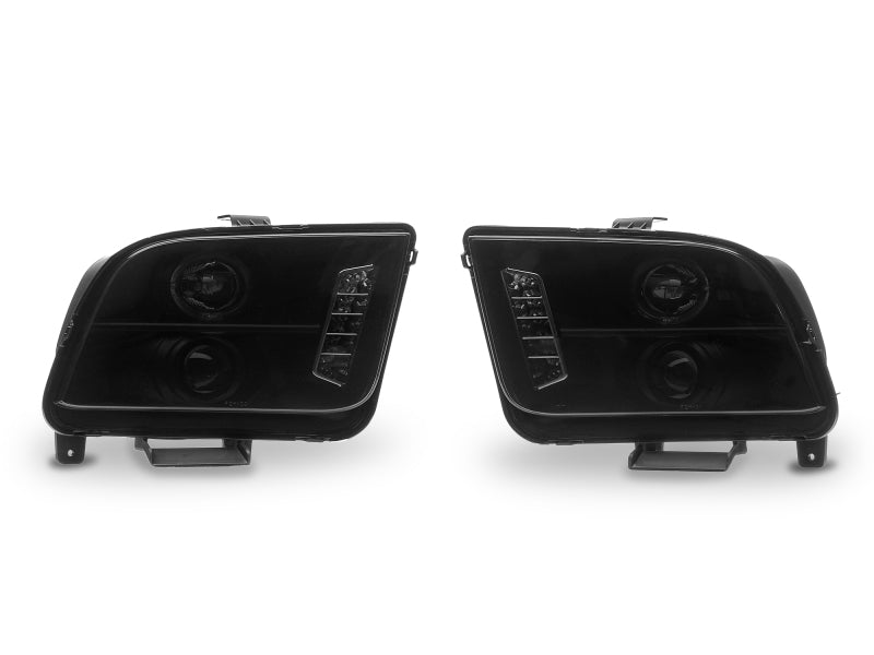 Raxiom 05-09 Ford Mustang w/ Halogen LED Halo Prjctr Headlights-Blk Hsng(Smoked Lens Exclude GT500) Headlights Raxiom
