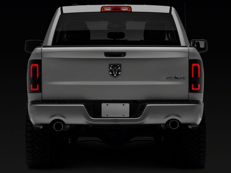 Raxiom 09-18 Dodge RAM 1500/2500/3500 Axial Series LED Tail Lights- Blk Housing (Smoked Lens) Tail Lights Raxiom