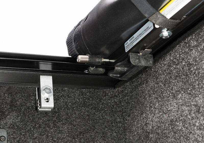 Truxedo 05-15 Nissan Navara w/Rack 4ft 10in Lo Pro International Bed Cover Bed Covers - Roll Up Truxedo