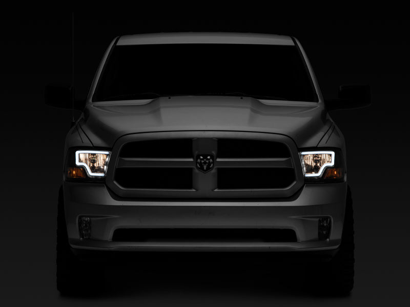 Raxiom 09-18 Dodge RAM 1500 LED Bar Headlights- Black Housing (Clear Lens) Headlights Raxiom