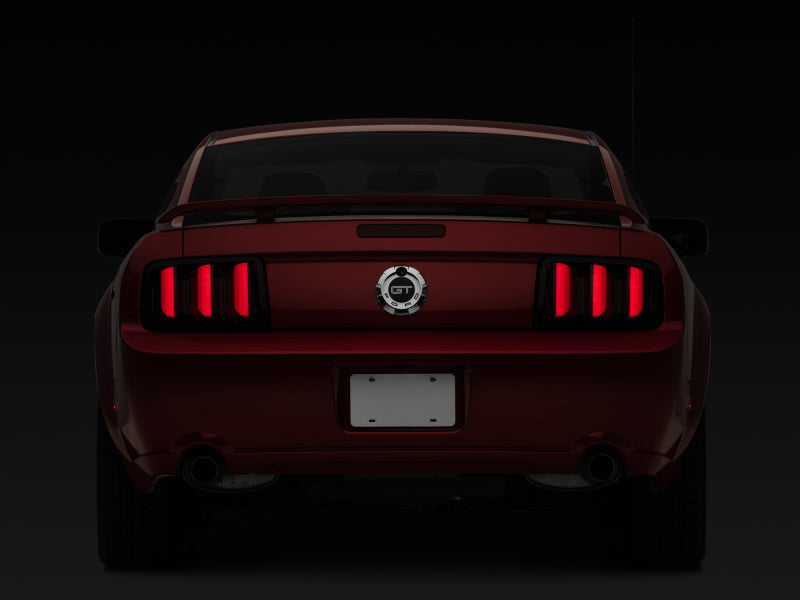Raxiom 05-09 Ford Mustang Vector V2 LED Tail Lights- Black Housing (Smoked Lens) Tail Lights Raxiom