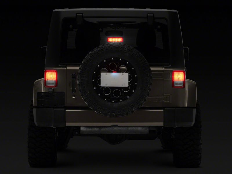 Raxiom 07-18 Jeep Wrangler JK Axial Series License Plate Bracket w/ LED Brake Light Brake Lights Raxiom