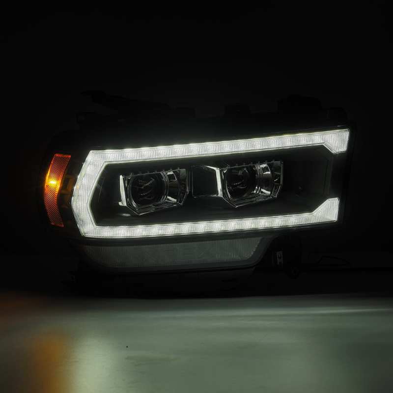 AlphaRex 19-21 Ram 2500 PRO-Series Projector Headlights Plank Style Black w/Activation Light Headlights AlphaRex