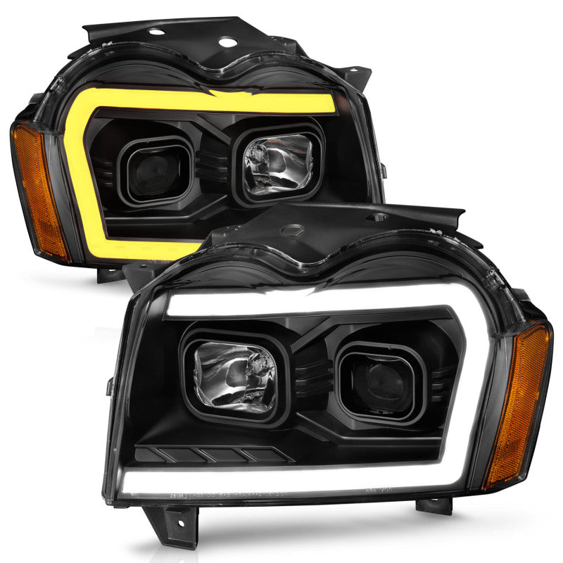 ANZO 2005-2007 Jeep Grand Cherokee Projector Headlights w/ Light Bar Switchback Black Housing Headlights ANZO