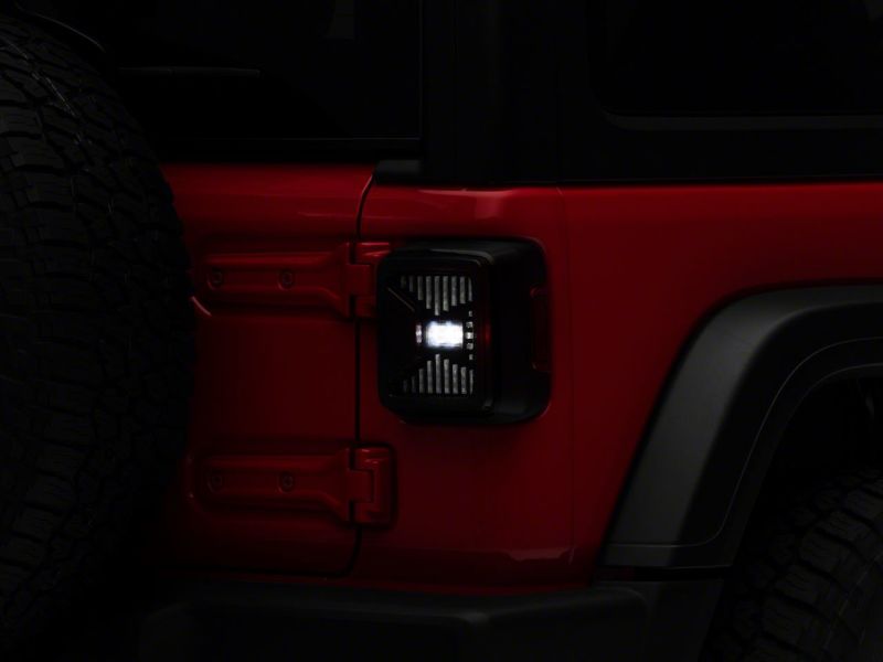 Raxiom 18-23 Jeep Wrangler JL LED Tail Lights- Blk Housing (Smoked Lens) Tail Lights Raxiom