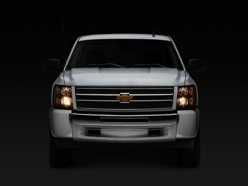 Raxiom 07-13 Chevrolet Silverado 1500 Euro Headlights- Black Housing (Clear Lens) Headlights Raxiom