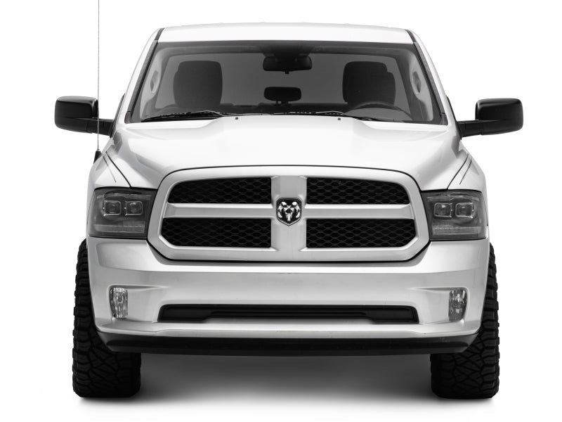 Raxiom 09-18 RAM 1500 LED Projector Headlights w/ Switchback Turn Signals- Blk Housing (Clear Lens) Headlights Raxiom