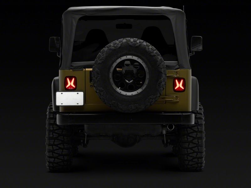 Raxiom 76-06 Jeep CJ7 Wrangler YJ & TJ Gladiator LED Tail Lights- Blk Housing (Smoked Lens) Tail Lights Raxiom