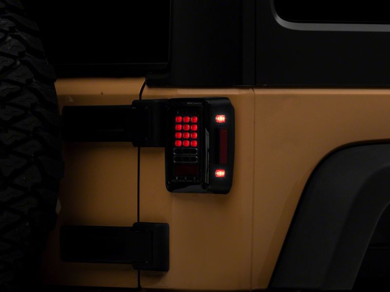 Raxiom 07-18 Jeep Wrangler JK Axial Series LED Tail Lights- Blk Housing (Clear Lens) Tail Lights Raxiom