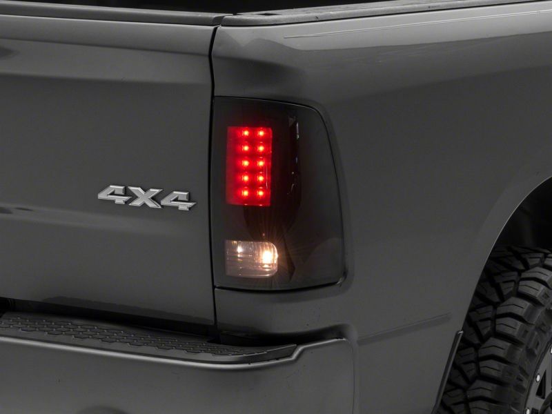 Raxiom 09-18 Dodge RAM 1500/2500/3500 Axial Series LED Tail Lights- BlkHousing- SmokedLens Tail Lights Raxiom