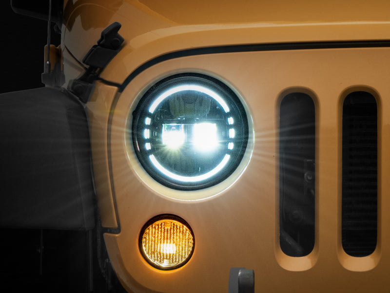 Raxiom 97-18 Jeep Wrangler TJ/JK Axial 7-Inch LED Headlights w/ DRL- Black Housing (Clear Lens) Headlights Raxiom