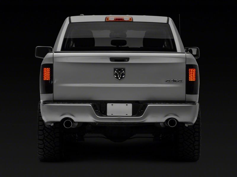 Raxiom 09-18 Dodge RAM 1500/2500/3500 Axial Series LED Tail Lights- BlkHousing- SmokedLens Tail Lights Raxiom
