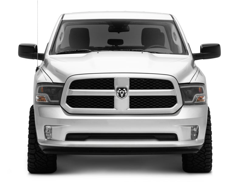Raxiom 09-18 RAM 1500 LED Halo Projector Headlights- Black Housing (Clear Lens) Headlights Raxiom