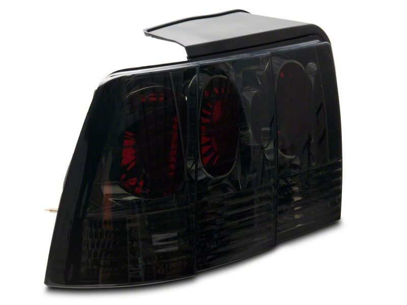 Raxiom 99-04 Ford Mustang Axial Series Altezza Style Tail Lights- Blk Housing (Smoked Lens) Tail Lights Raxiom