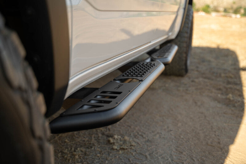 DV8 Offroad 19-25 RAM 1500 Crew Cab OE Plus Side Steps - Black Steel Side Steps DV8 Offroad