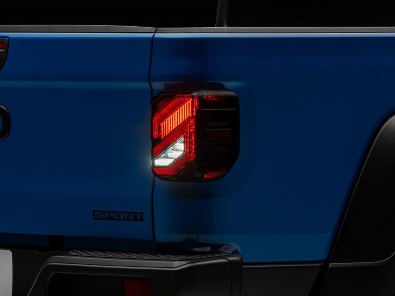 Raxiom 20-23 Jeep Gladiator JT Axial Series LED Tail Lights- Blk Housing (Smoked Lens) Tail Lights Raxiom