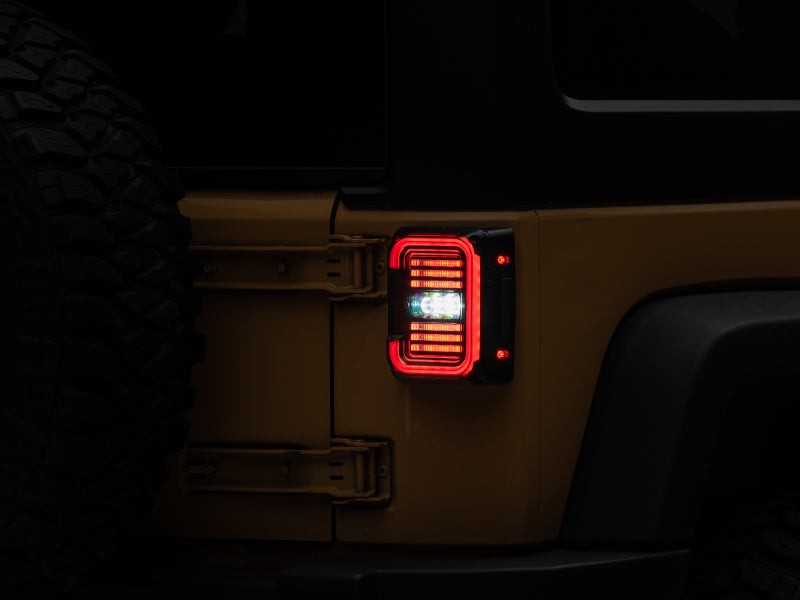 Raxiom 07-18 Jeep Wrangler JK Axial Series LED Halo Tail Lights- Black Housing (Dark Smoked Lens) Tail Lights Raxiom
