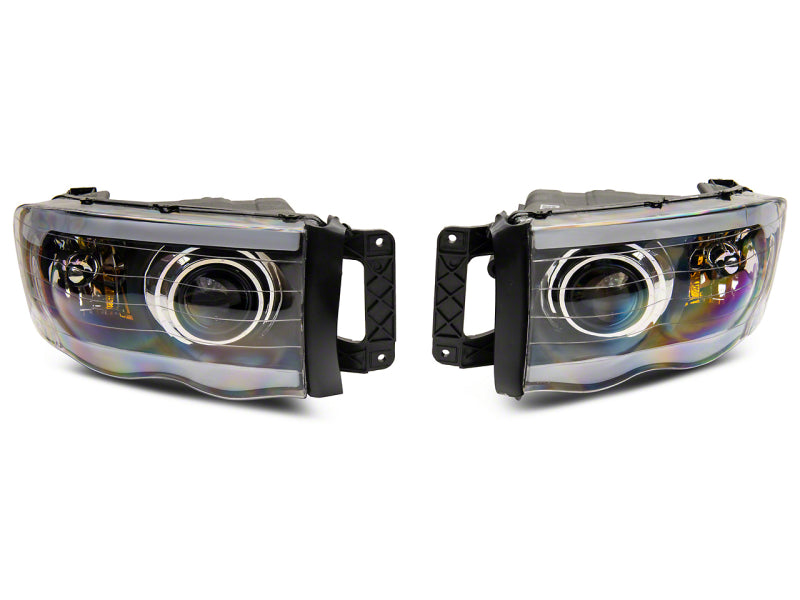 Raxiom 02-05 Dodge RAM 1500 LED Projector Headlights w/ SEQL LED Bar- Blk Housing (Clear Lens) Headlights Raxiom